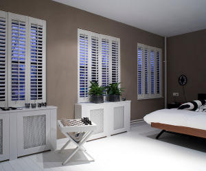 Bespoke shutters installed in a bedroom